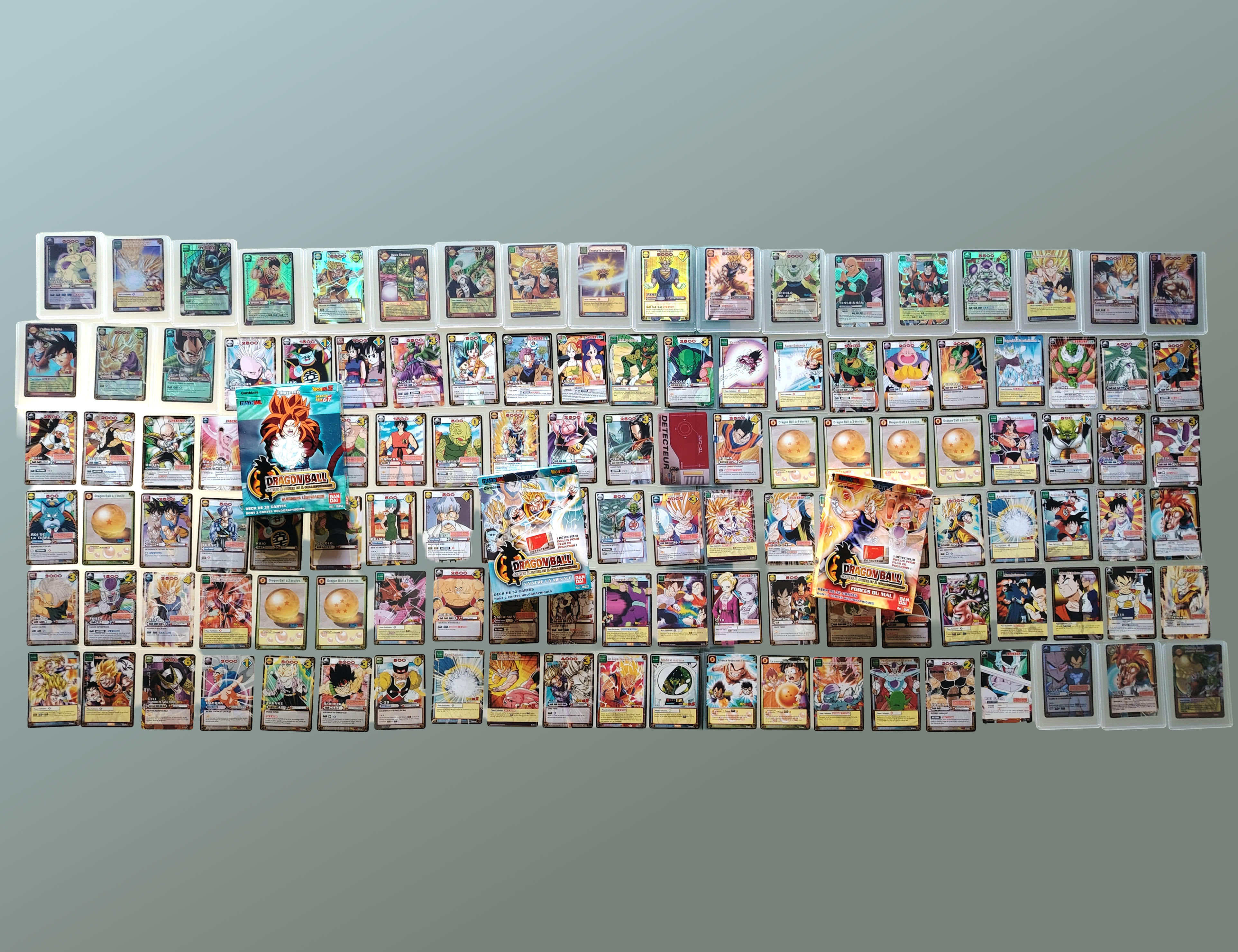 Set of 124 Dragon Ball JCC cards with 3 empty decks (2005-2009)